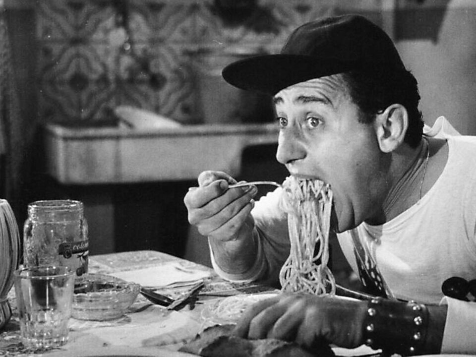 Person eating italian food
